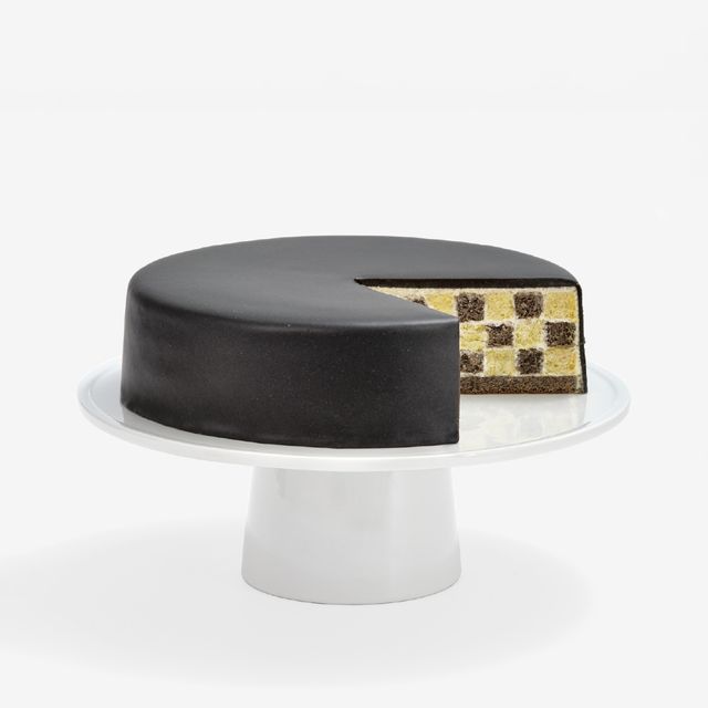 Sesame Checkers sliced revealing checkboard design within of black sesame cake and vanilla cake finished with a sesame ganache glaze